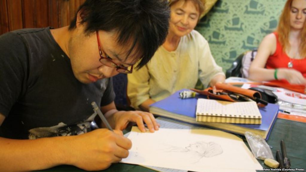Arms Smuggler Or History Buff? Japanese Comics Artist 'Struggling' In Belarusian Prison
